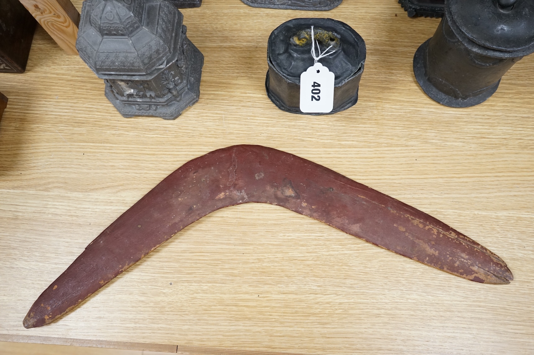 An Australian aboriginal boomerang, 56cm wide, collected in Australia c.1945